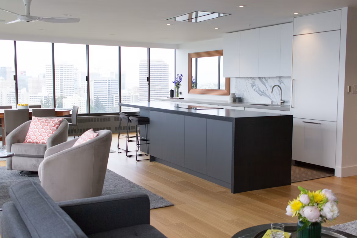 Open kitchen flowing into a bright living room
